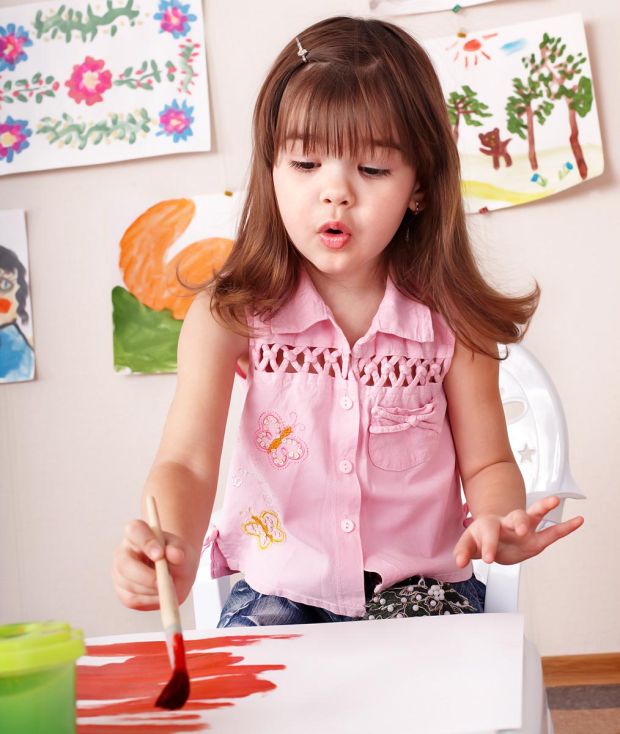 image of child painting